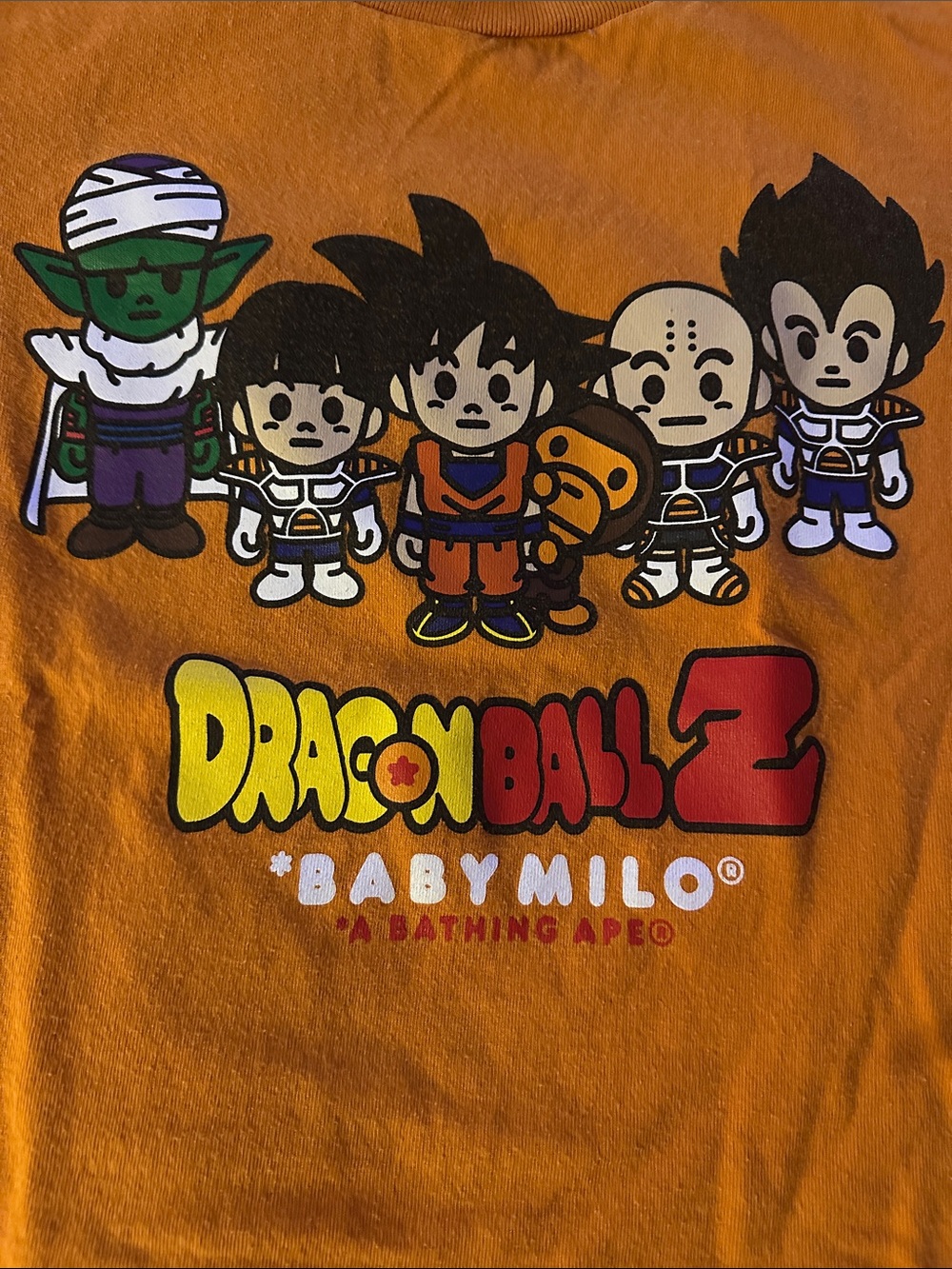 A Bathing Ape | Women’s XS/ Big Kid Orange Anime Dragonball Z x Milo Baby Tee